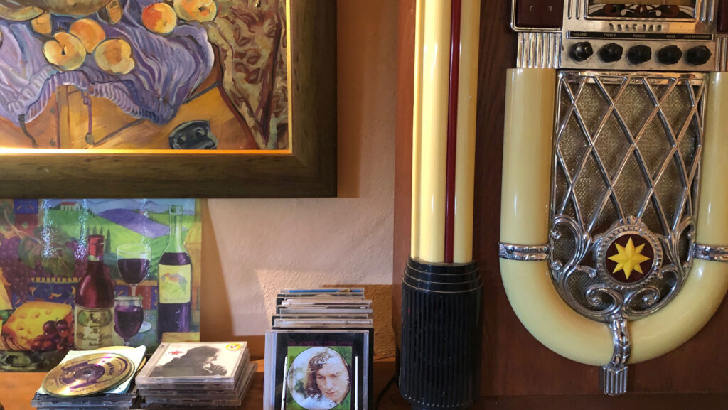 A vintage Jukebox and some of his CD collection